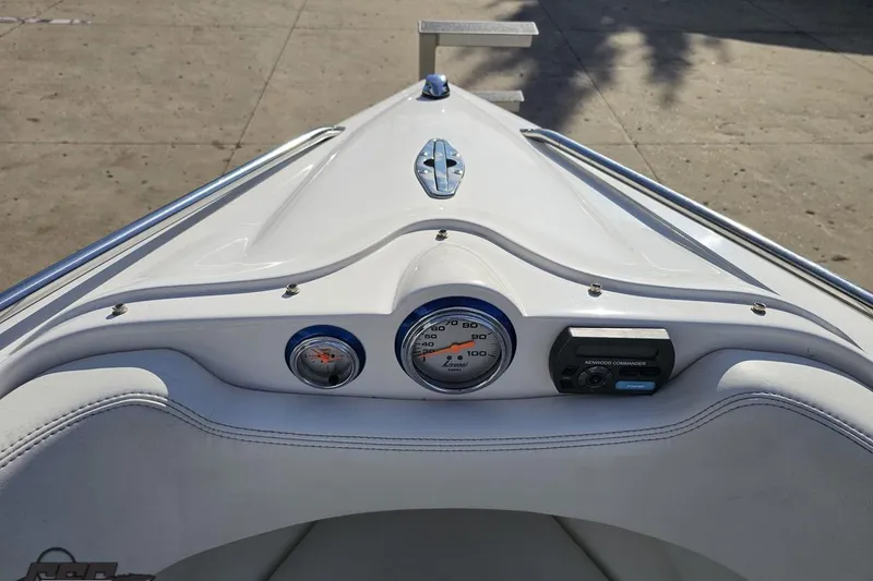 Slide: The Image of 2010 Sunsation 288 MID-CABIN boat dashboard with gauges and controls. - 90