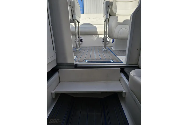 Slide: The Image of 2010 Sunsation 288 MID-CABIN interior with sleek seating and modern flooring. - 95