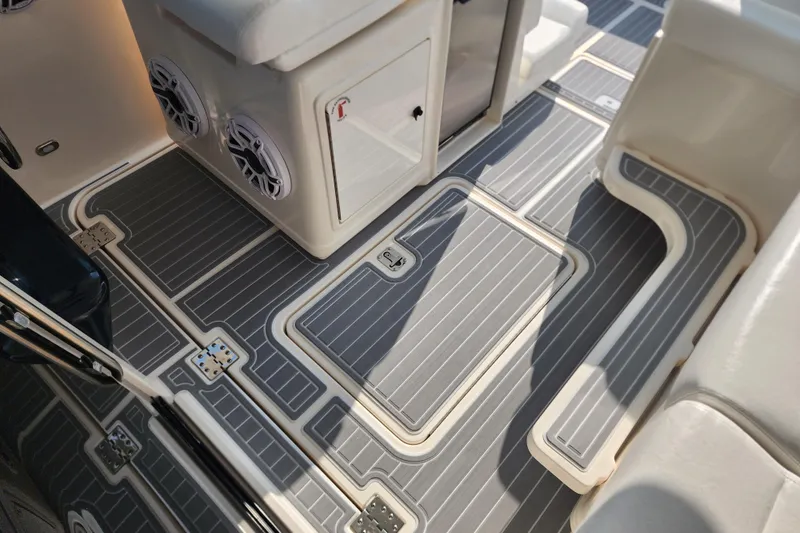 Slide: The Image of 2001 Tiara Yachts 3500 Open interior with sleek, modern flooring and seating. - 9