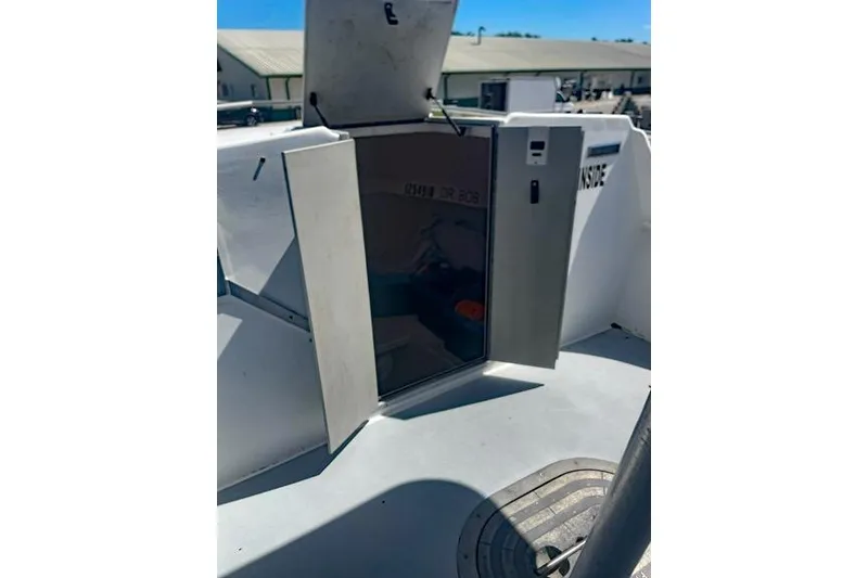 Slide: The Image of Open hatch on 2014 Newton 31 Dive Special boat, revealing interior details. - 15