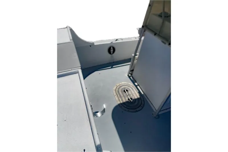 Slide: The Image of Interior view of a 2014 Newton 31 Dive Special boat deck. - 16