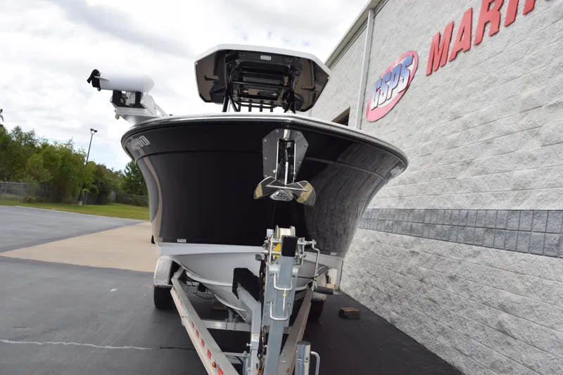 Slide: The Image of 2023 Blackfin 252 CC boat on trailer outside marine dealership. - 3