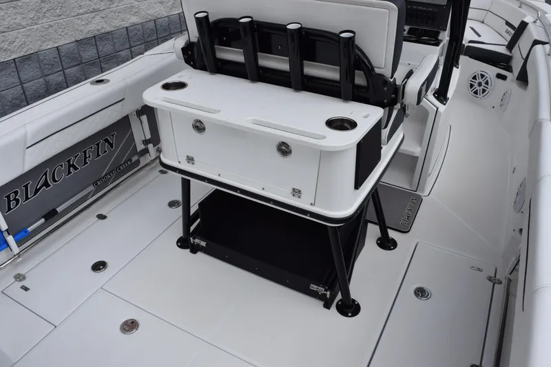 Slide: The Image of 2023 Blackfin 252 CC boat interior with seating and storage features. - 9