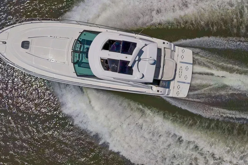 Slide: The Image of Aerial view of 2009 Sea Ray 470 Sundancer yacht cruising on water. - 10