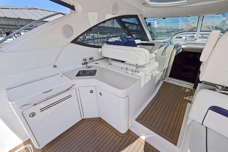 Slide: The Image of Luxurious interior of 2009 Sea Ray 470 Sundancer yacht with sleek design and modern amenities. - 26