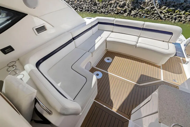 Slide: The Image of Luxurious seating area on 2009 Sea Ray 470 Sundancer yacht with elegant wood flooring. - 38