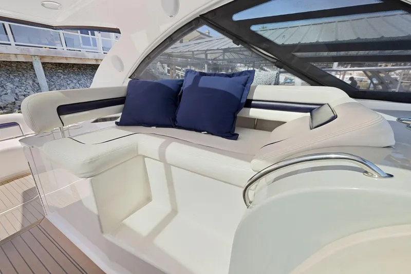 Slide: The Image of Luxurious seating area on 2009 Sea Ray 470 Sundancer yacht with blue cushions. - 39