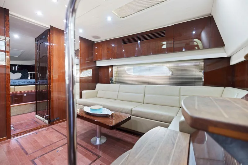 Slide: The Image of Luxurious interior of 2009 Sea Ray 470 Sundancer yacht with elegant seating and wood finishes. - 41