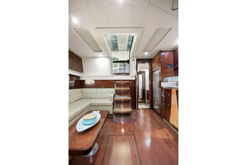 Slide: The Image of Luxurious interior of 2009 Sea Ray 470 Sundancer yacht with elegant wood finishes. - 50