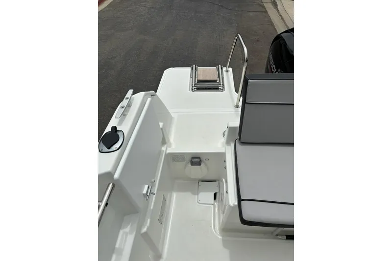Slide: The Image of 2023 Jeanneau NC Weekender 695 Series 2 boat deck with seating and railing. - 5