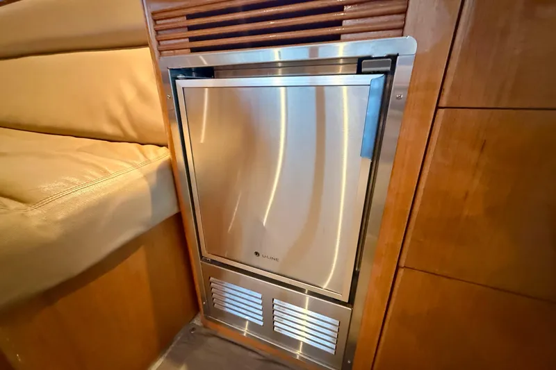Slide: The Image of Stainless steel fridge in 2001 Riviera 40 Flybridge yacht interior. - 57