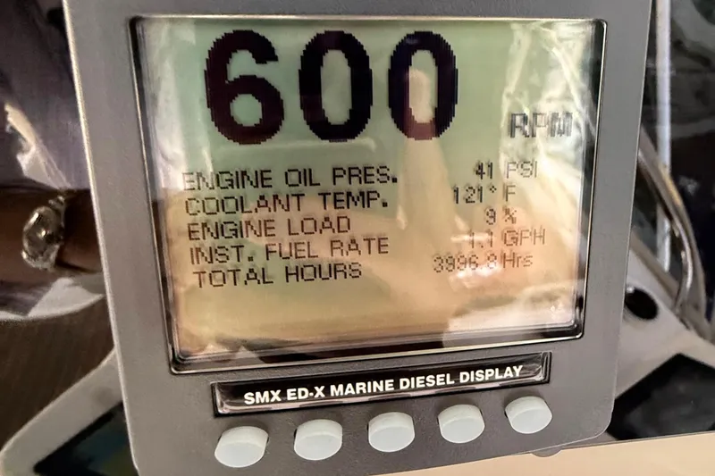 Slide: The Image of Marine diesel display showing engine metrics on a 2001 Riviera 40 Flybridge. - 62