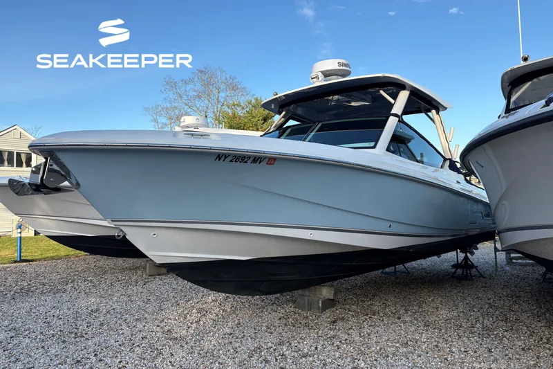 The Image of 2024 Boston Whaler 280 Vantage boat on display with Seakeeper logo. - 0
