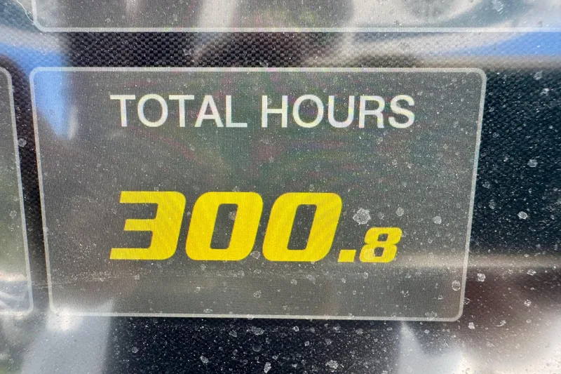 Slide: The Image of Regulator 26XO 2021 boat display showing 300.8 total hours. - 12