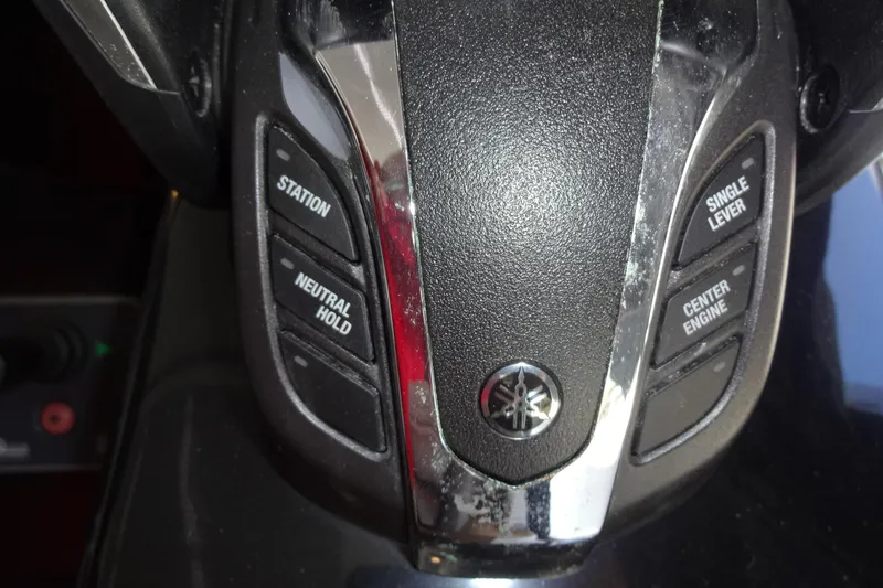 Slide: The Image of Close-up of Yamaha boat control panel on 2022 Jeanneau Merry Fisher 895 Offshore. - 100