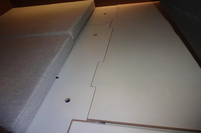 Slide: The Image of Interior view of 2022 Jeanneau Merry Fisher 895 Offshore cabin with cushions. - 119