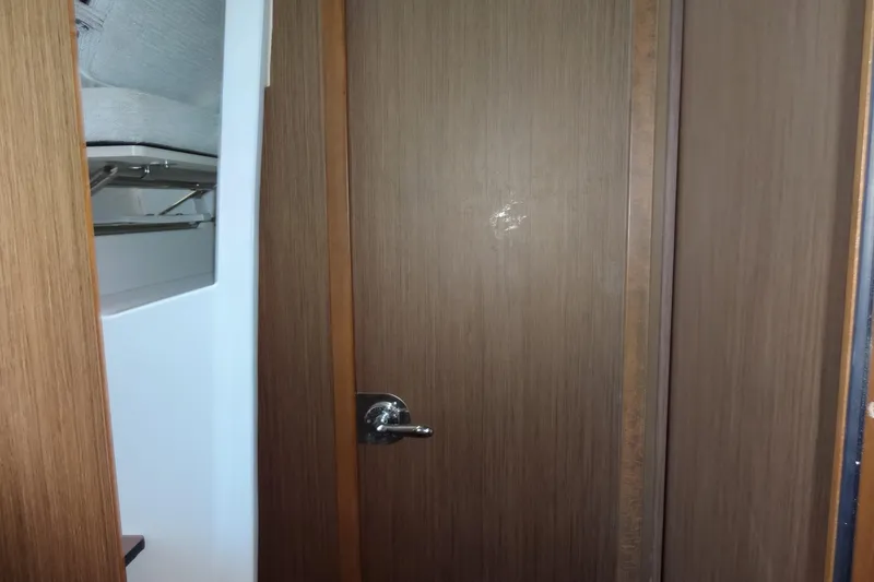 Slide: The Image of Interior cabin door of 2022 Jeanneau Merry Fisher 895 Offshore boat. - 132