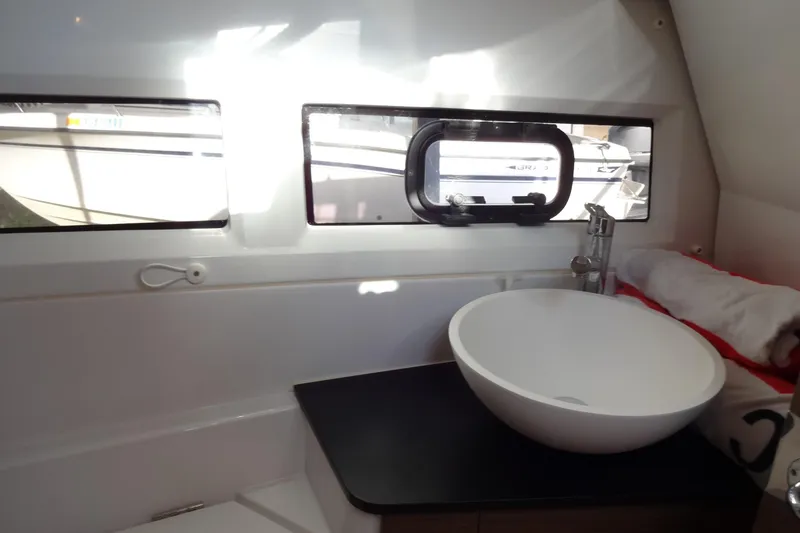 Slide: The Image of Interior of 2022 Jeanneau Merry Fisher 895 Offshore, featuring a modern bathroom sink. - 137