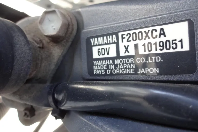 Slide: The Image of Yamaha F200XCA engine label on 2022 Jeanneau Merry Fisher 895 Offshore boat. - 142