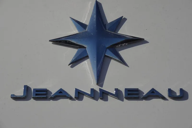 Slide: The Image of Jeanneau logo on Merry Fisher 895 Offshore, 2022 model boat. - 144