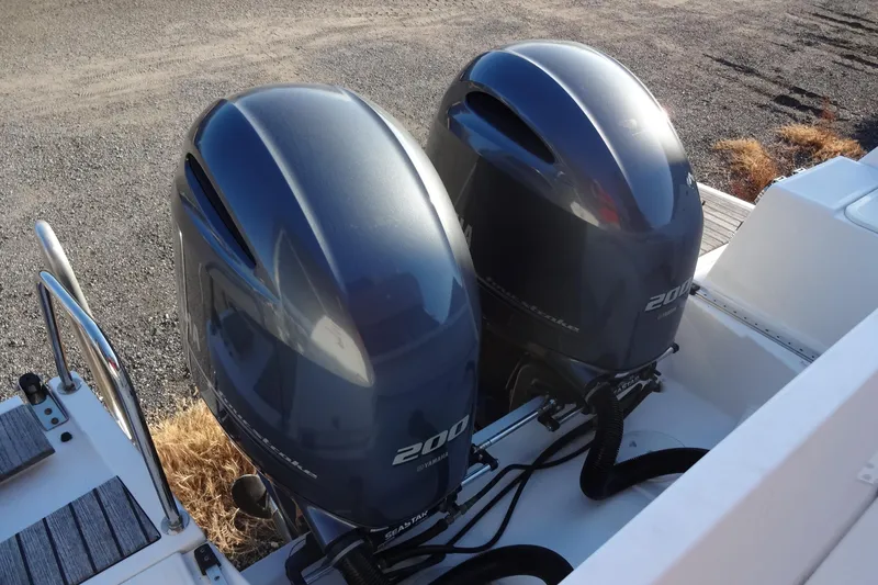 Slide: The Image of Twin Yamaha 200 outboard engines on 2022 Jeanneau Merry Fisher 895 Offshore boat. - 31