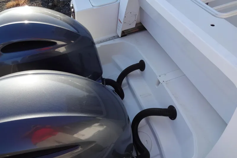 Slide: The Image of 2022 Jeanneau Merry Fisher 895 Offshore with dual outboard motors. - 32