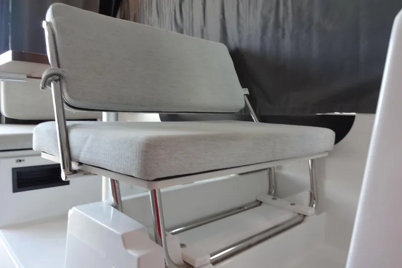 Slide: The Image of 2022 Jeanneau Merry Fisher 895 Offshore interior seating with modern design and comfortable upholstery. - 48