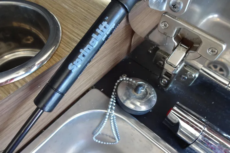 Slide: The Image of Interior detail of 2022 Jeanneau Merry Fisher 895 Offshore boat kitchen area. - 59