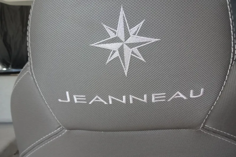 Slide: The Image of Jeanneau Merry Fisher 895 Offshore 2022 seat with embroidered logo and star design. - 69