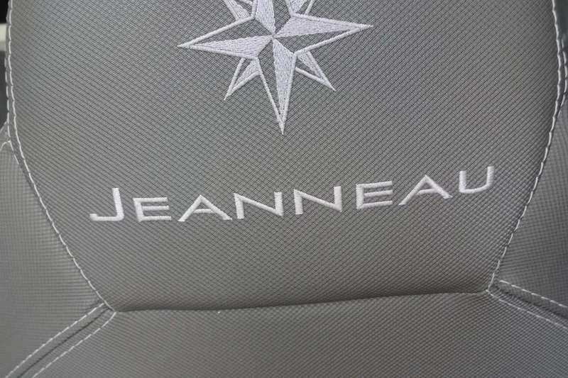 Slide: The Image of Jeanneau Merry Fisher 895 Offshore 2022 seat with embroidered logo and star design. - 70