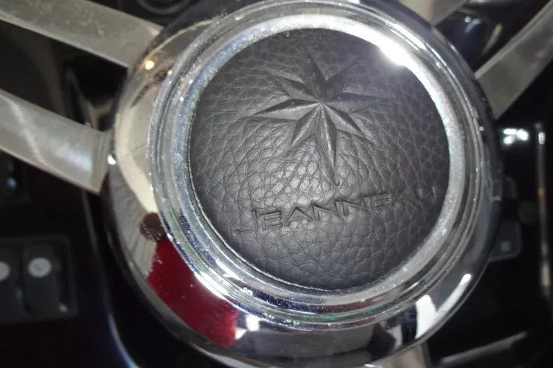 Slide: The Image of Close-up of Jeanneau Merry Fisher 895 Offshore 2022 steering wheel emblem. - 72