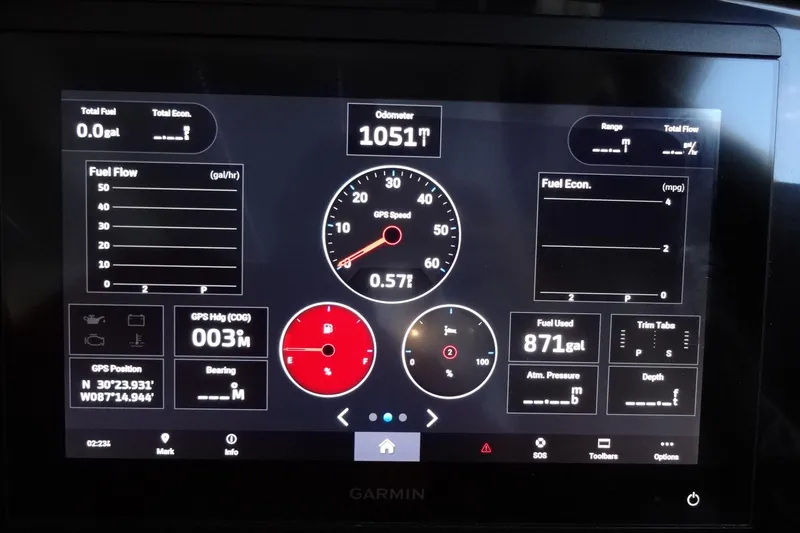 Slide: The Image of Garmin marine display on 2022 Jeanneau Merry Fisher 895 Offshore showing fuel and navigation data. - 78