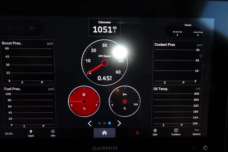 Slide: The Image of Dashboard of 2022 Jeanneau Merry Fisher 895 Offshore showing odometer and engine metrics. - 79