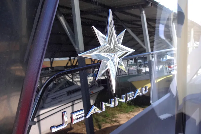 Slide: The Image of 2022 Jeanneau Merry Fisher 895 Offshore logo on boat exterior. - 8