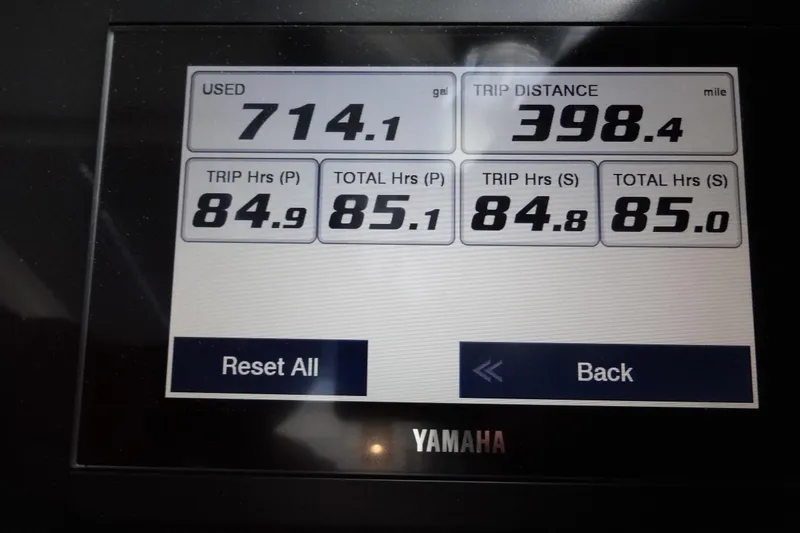 Slide: The Image of Yamaha display showing fuel usage and trip data for Jeanneau Merry Fisher 895 Offshore 2022. - 90
