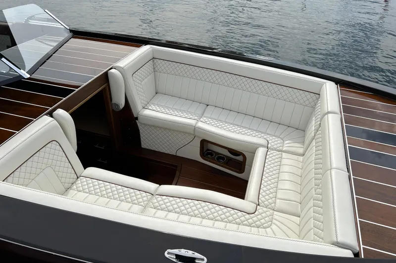 Slide: The Image of Luxurious interior of 2019 StanCraft 380 Hammerhead boat with white quilted seating. - 5