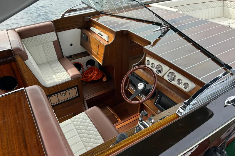 Slide: The Image of Luxurious 2019 StanCraft 380 Hammerhead boat interior with elegant wood and leather finishes. - 7