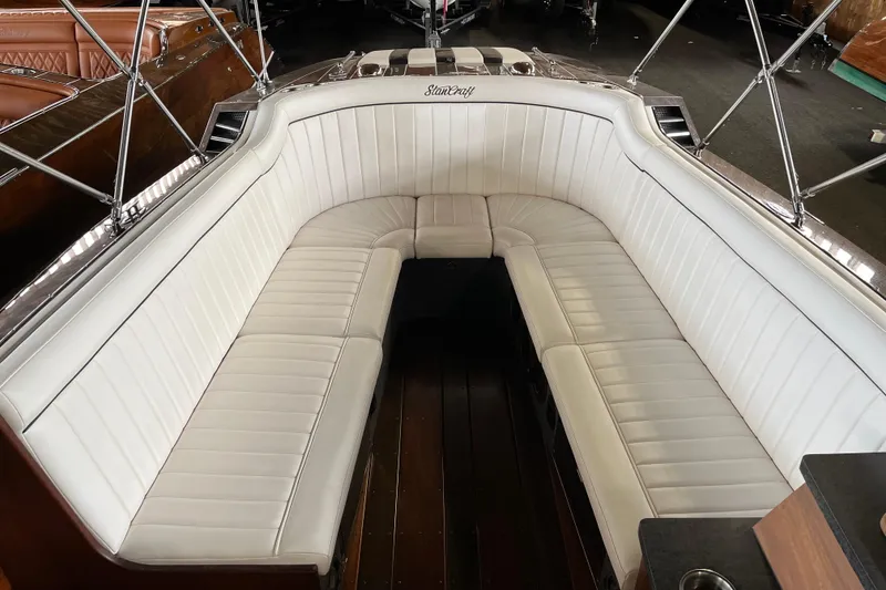 Slide: The Image of 2013 StanCraft 34 Highboy Deluxe boat with elegant white leather seating. - 17