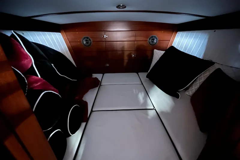 Slide: The Image of Luxurious interior cabin of 2013 StanCraft 34 Highboy Deluxe boat with plush seating. - 22