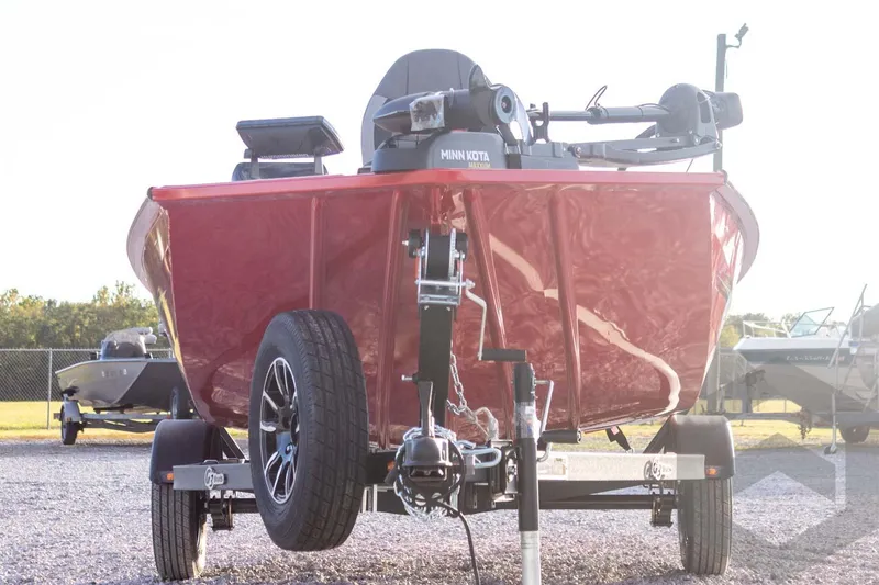 Slide: The Image of 2026 G3 Sportsman 1710 SE boat on trailer, featuring Minn Kota motor. - 10