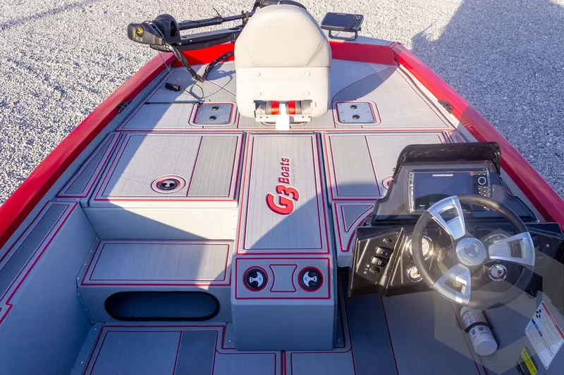 Slide: The Image of 2026 G3 Sportsman 1710 SE boat interior with steering wheel and seating. - 21