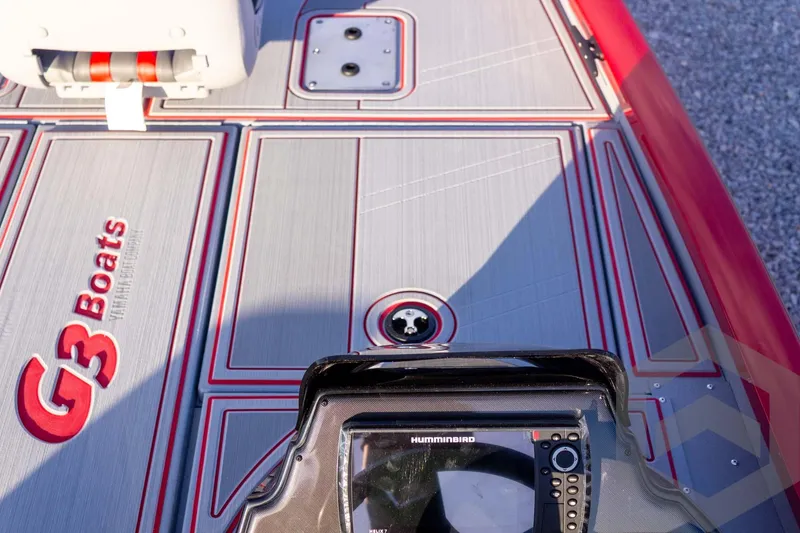 Slide: The Image of 2026 G3 Sportsman 1710 SE boat deck with Humminbird electronics and G3 branding. - 24