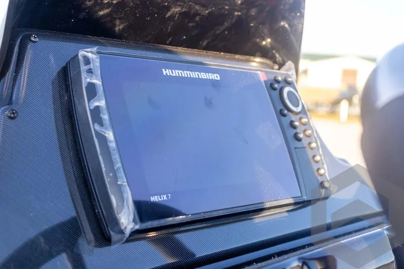 Slide: The Image of Helix 7 fish finder on 2026 G3 Sportsman 1710 SE boat dashboard. - 35