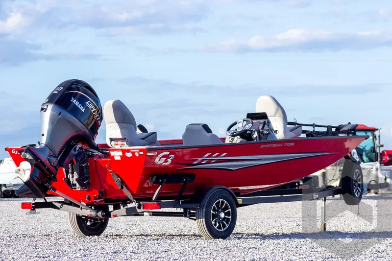Slide: The Image of 2026 G3 Sportsman 1710 SE boat, red exterior, on a trailer with Yamaha engine. - 4