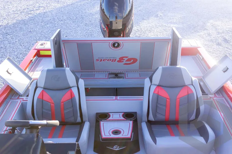 Slide: The Image of 2026 G3 Sportsman 1710 SE boat interior with dual seats and storage compartments. - 44