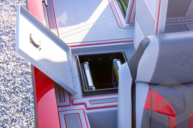 Slide: The Image of 2026 G3 Sportsman 1710 SE boat interior with open storage compartment and seat detail. - 46