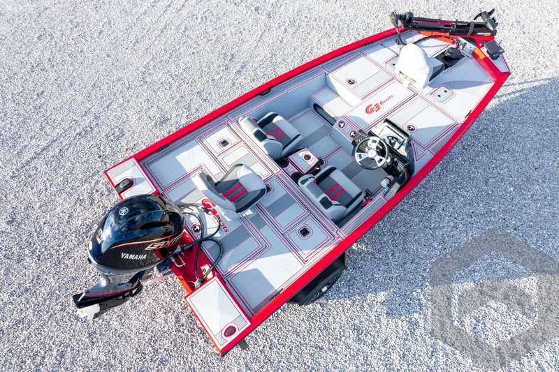 Slide: The Image of 2026 G3 Sportsman 1710 SE boat with Yamaha engine, aerial view on gravel surface. - 57