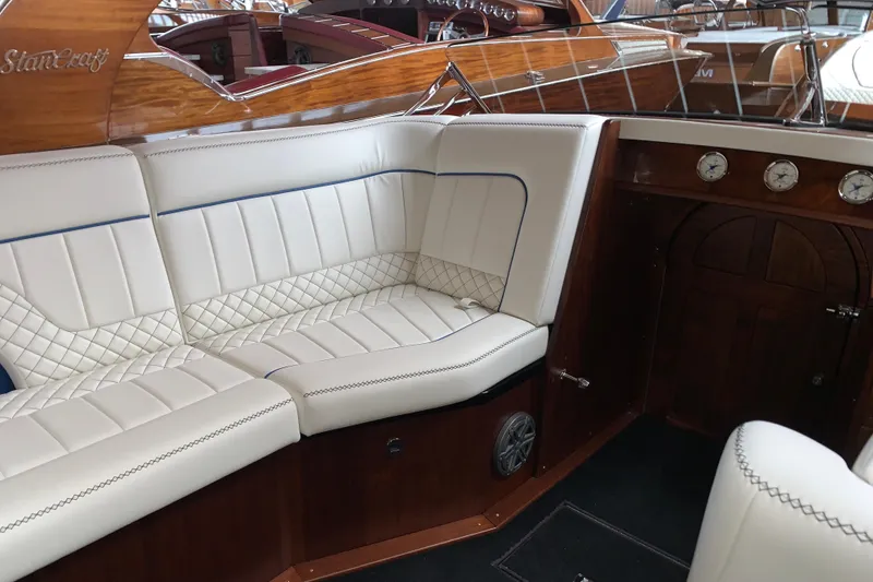 Slide: The Image of Luxurious interior of 2017 StanCraft 24 Highboy Surf boat with elegant white seating. - 10
