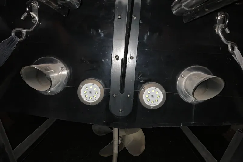 Slide: The Image of 2017 StanCraft 24 Highboy Surf boat stern with exhaust and LED lights. - 22