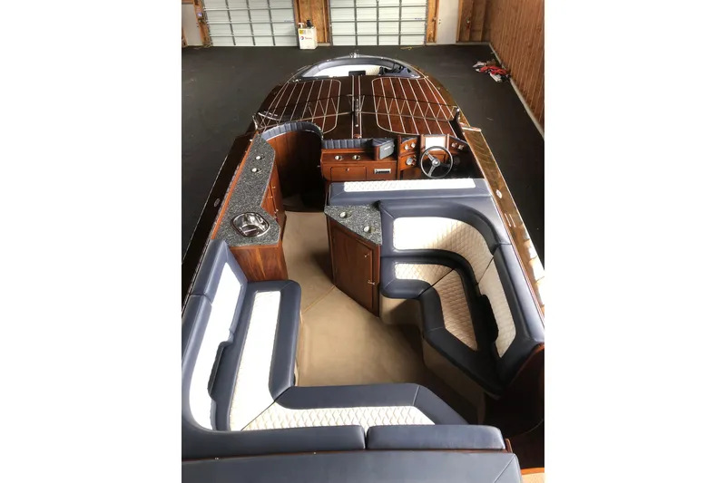 Slide: The Image of Luxurious 2013 StanCraft 360 Rivelle boat interior with elegant seating and wooden finishes. - 13